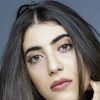 Yasmine Bouabid as Isra