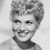 Judy Holliday as Nina Chapman Tracey