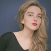 Alisa Mironova as Russian Wife