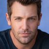 Tim Ross as Greg