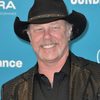 James Hetfield as Simon Deasy