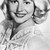 Peggy Maley as Veda Pinelli