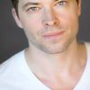 Brad Hodder as Eric Carrinton