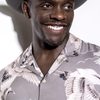 Chris Chalk as Orderly