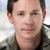 Brandon Ray Olive as Tom Walton