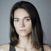 Rachel Finninger as Alex