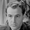 Reginald Sheffield as Mr. Woburn, English tourist