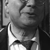Enzo Petito as Napoleone, l'usciere