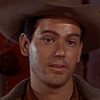 David Garfield as Witness Miller