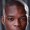 Jerome Holder as John Holding