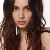 Bailee MyKell Cowperthwaite as Young Woman