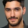 Amir Khoury as George