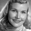 Eve McVeagh as Partygoer (uncredited)
