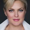 Elaine Hendrix as Coach Roach