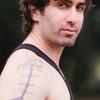 Aldo Razmjoo as Corman