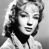 Venetia Stevenson as Joy Karrington