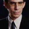 Richard Belzer as M.C. at Babylon Club