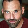 Ryan Davies as Alan