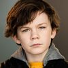 Tyler Crumley as Tom Hoffman