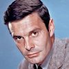 Louis Jourdan as Arcane