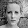 Eleonora Martinelli as The Merchant Assistant