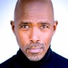 Ntare Guma Mbaho Mwine as Captain Joe Freeman
