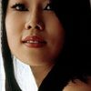 China Lee as Roller Derby Patron