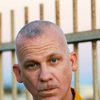 Jason Dill as Father Mahoney