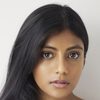 Charithra Chandran as Amelia Brown