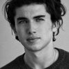 Charlie Evans as Archie Sandford