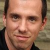 Erik Searle as Michael Adams