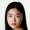 Vy Nguyen as Young Nelly