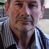 Simon Ferry as Garry Holden