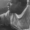 Chino 'Fats' Williams as Bar Patron