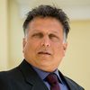 Atul Sharma as Immigrant