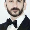 Michael Aronov as Leslie A. Davis