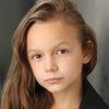 Mila Morgan as Young Girl