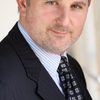 Andy Milder as Bruce