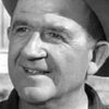 Patrick McVey as Munitions Plant Road Guard
