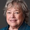 Kathy Bates as Miss Agatha Hannigan