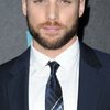 Dustin Milligan as Devin