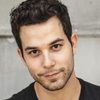Skylar Astin as Andrew