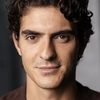 Anthony Pavone as Reggie
