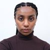 Kiah Butts as Kiah - Executive Secretary