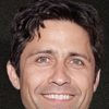 Byron Thames as Young Johnny