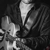 Kevin Oliver Jones as Musician in Theatre