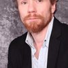 Travis MacDonald as Hitcher