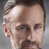 Crispian Belfrage as Charles Grimes