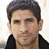 Raza Jaffrey as Dr. Simon Khal
