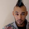 Sterling Jonatán Williams as Tattoo Librarian